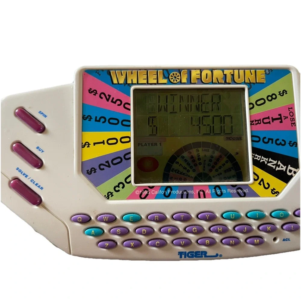 Vintage Tiger Electronics Wheel of Fortune Handheld Game Fun Family Working 1995